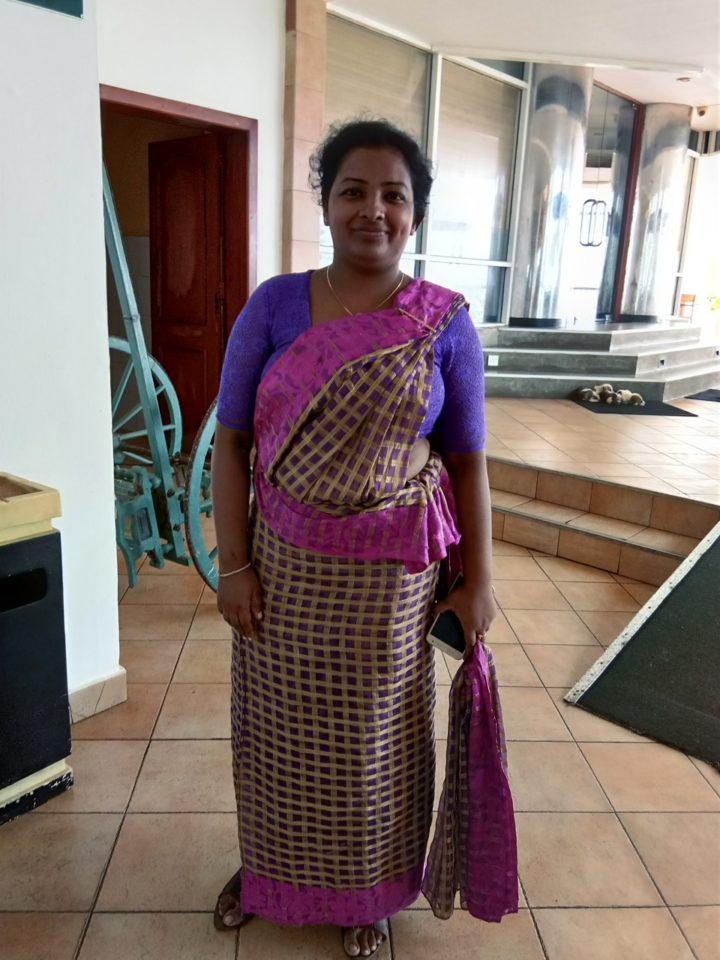 Sri Lankan Lady wearing a traditional saree